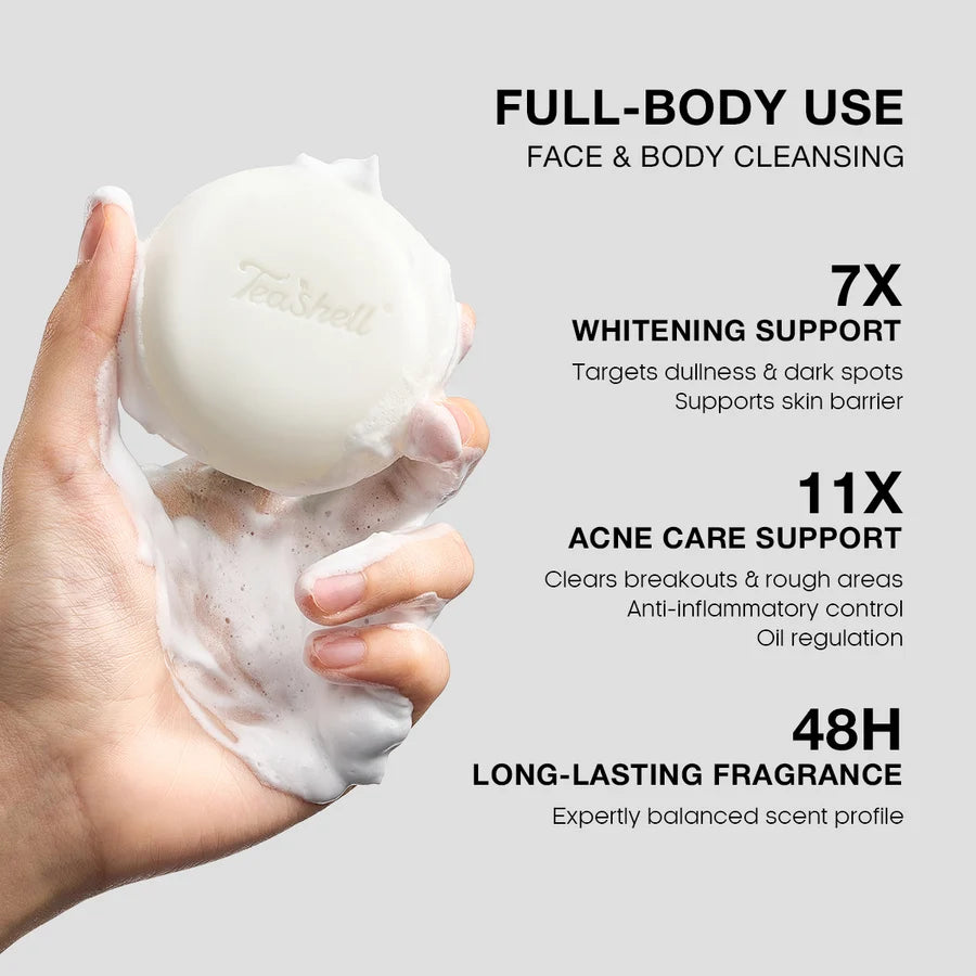 TeaShell Niacinamide Soap held in hand with lather for face and body cleansing